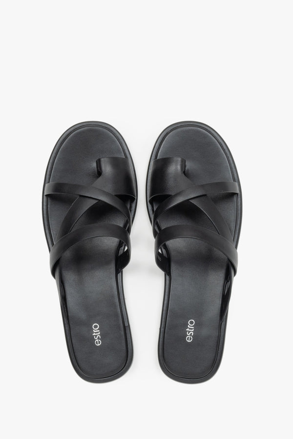 Women's minimalist black leather sandals with soft interwoven straps.