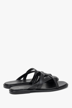 Estro black summer slides featuring a premium chevro leather insole.