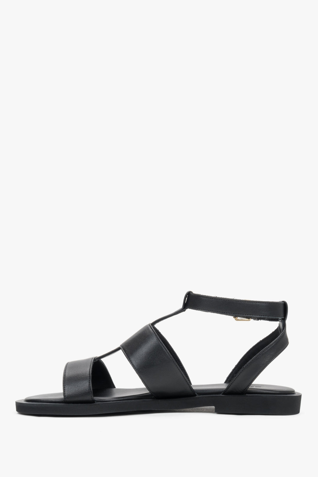 Minimalist black leather sandals featuring a comfortable PU sole and buckle closure.
