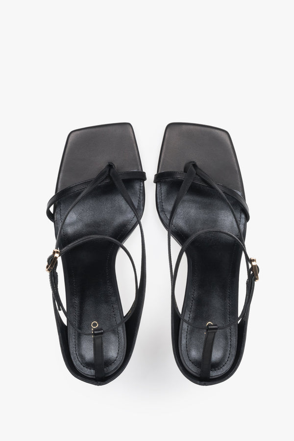 Elegant black sandals with thin straps, made of genuine leather, 7.5 cm heel – top view.