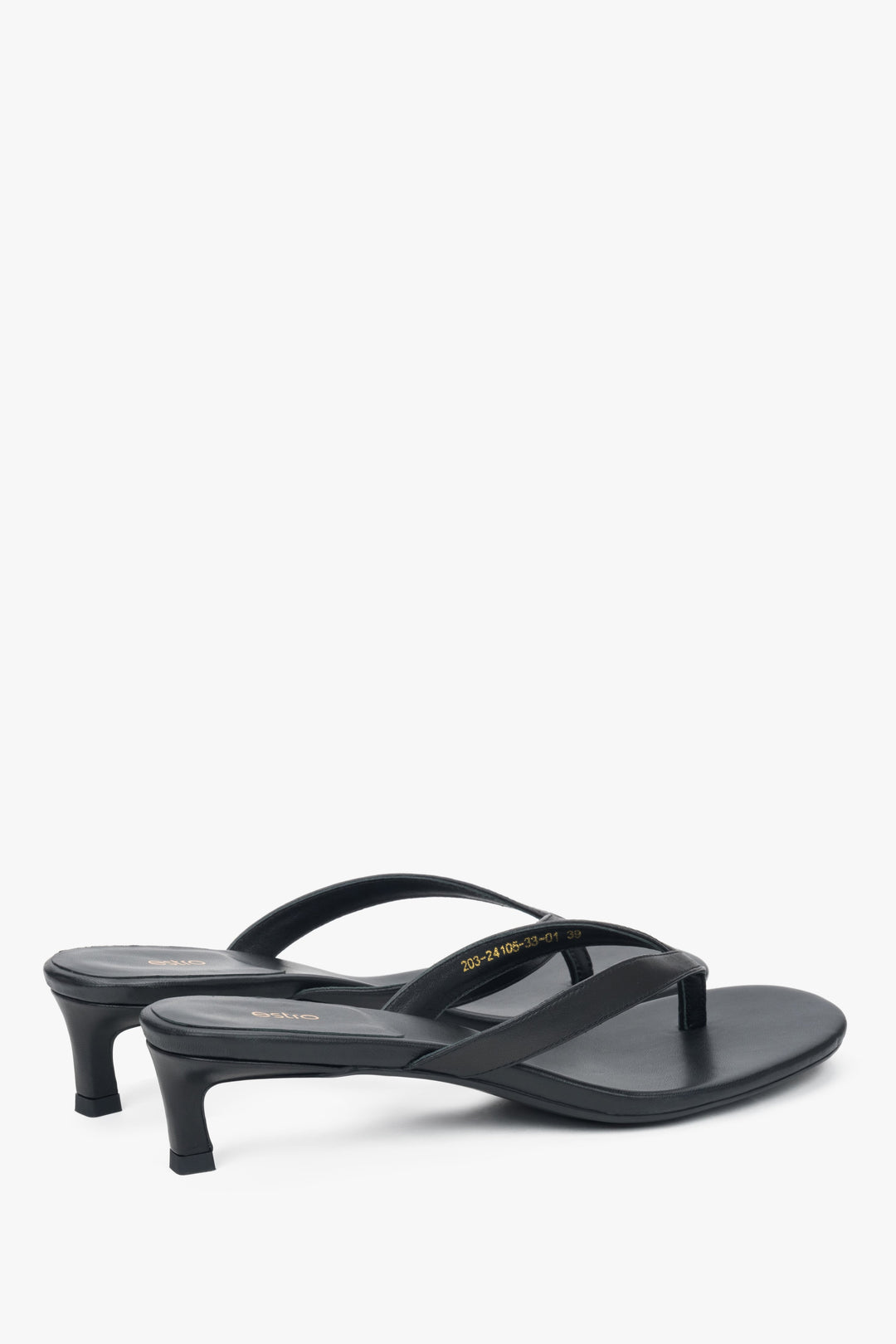 Women’s black leather thong sandals with a low heel by Estro.