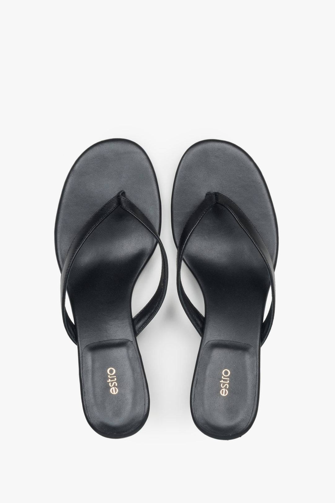 Black leather women’s thong sandals by Estro – top view.