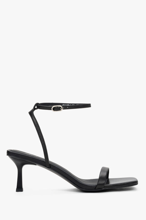 Women's black leather funnel heel sandals by Estro with silver details.