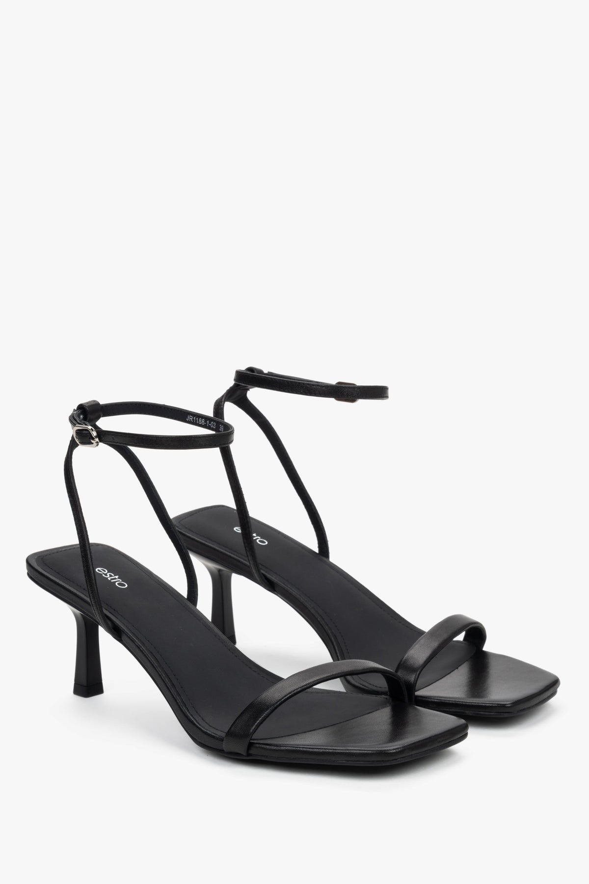 Side view of women's black leather sandals with stable funnel heel.