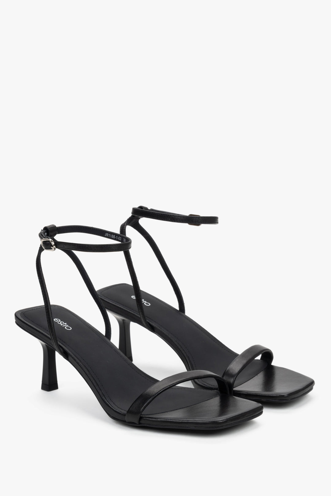 Side view of women's black leather sandals with stable funnel heel.