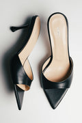 Women's black leather heeled mules with pointed open toe by Estro