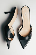 Women's black leather heeled mules with pointed open toe by Estro