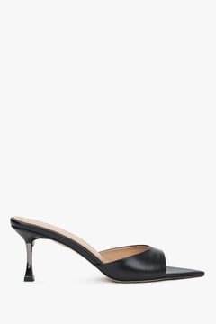 Side view of women's black leather heeled mules by Estro