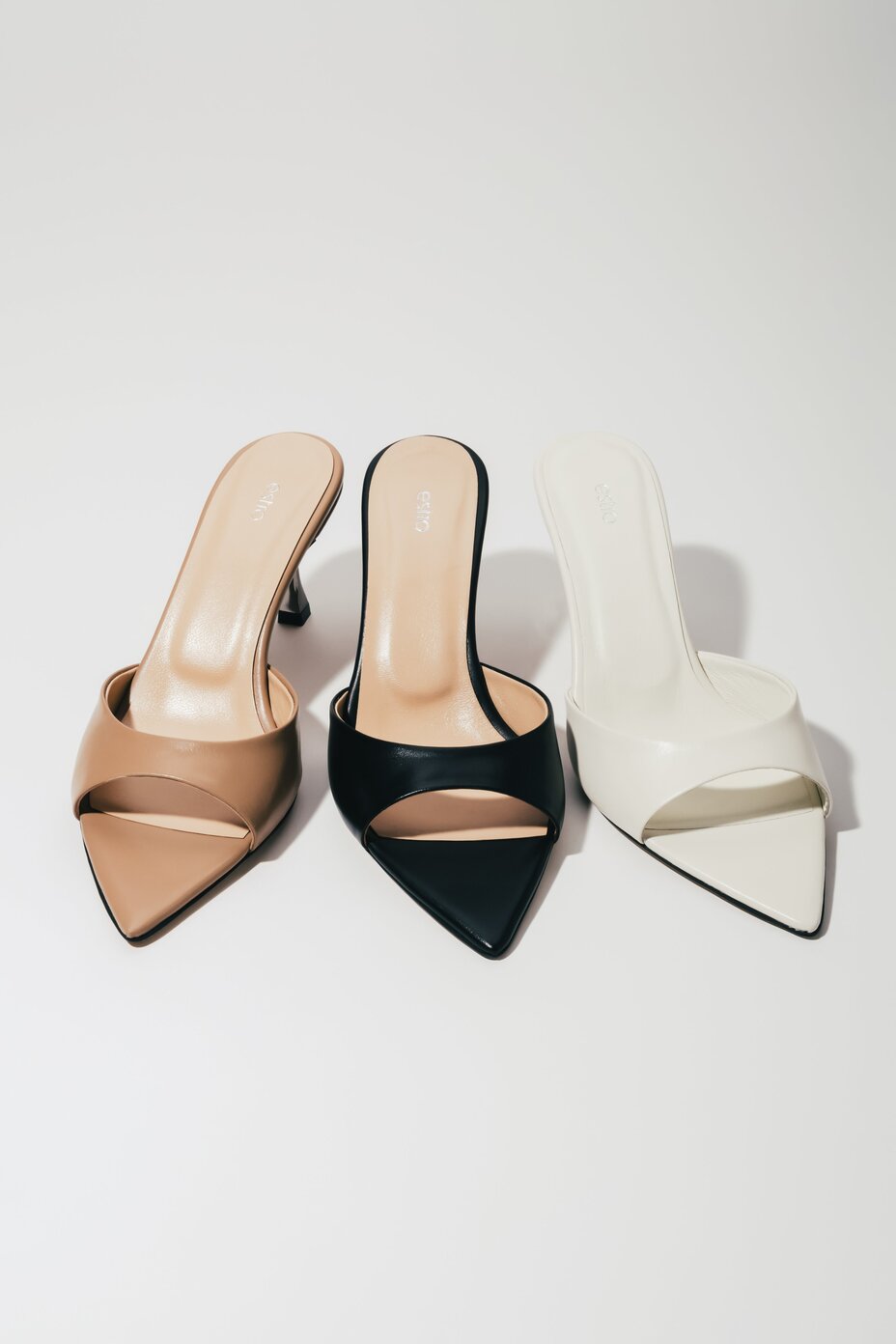 Three colour versions of women's pointed heeled mules by Estro