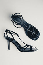 Women's black leather high heel sandals with thin straps by Estro Selection