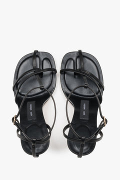 Top view of women's black leather high heel sandals by Estro Selection