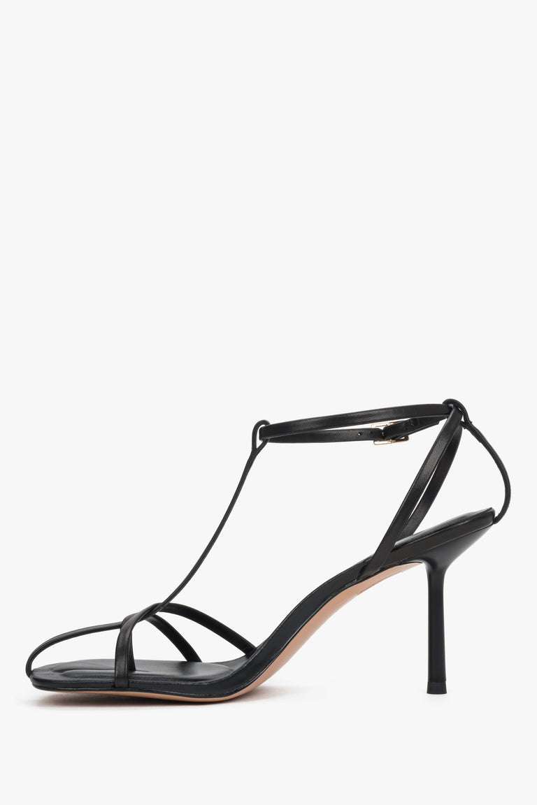 Low side view of women's black leather high heel sandals by Estro Selection