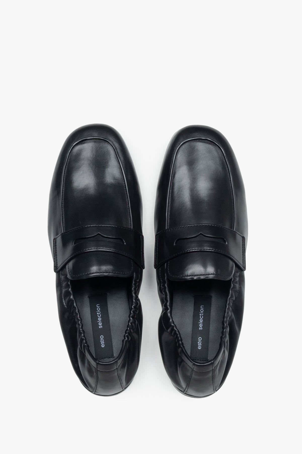 Women’s black loafers in genuine leather with a soft heel counter Estro Selection.