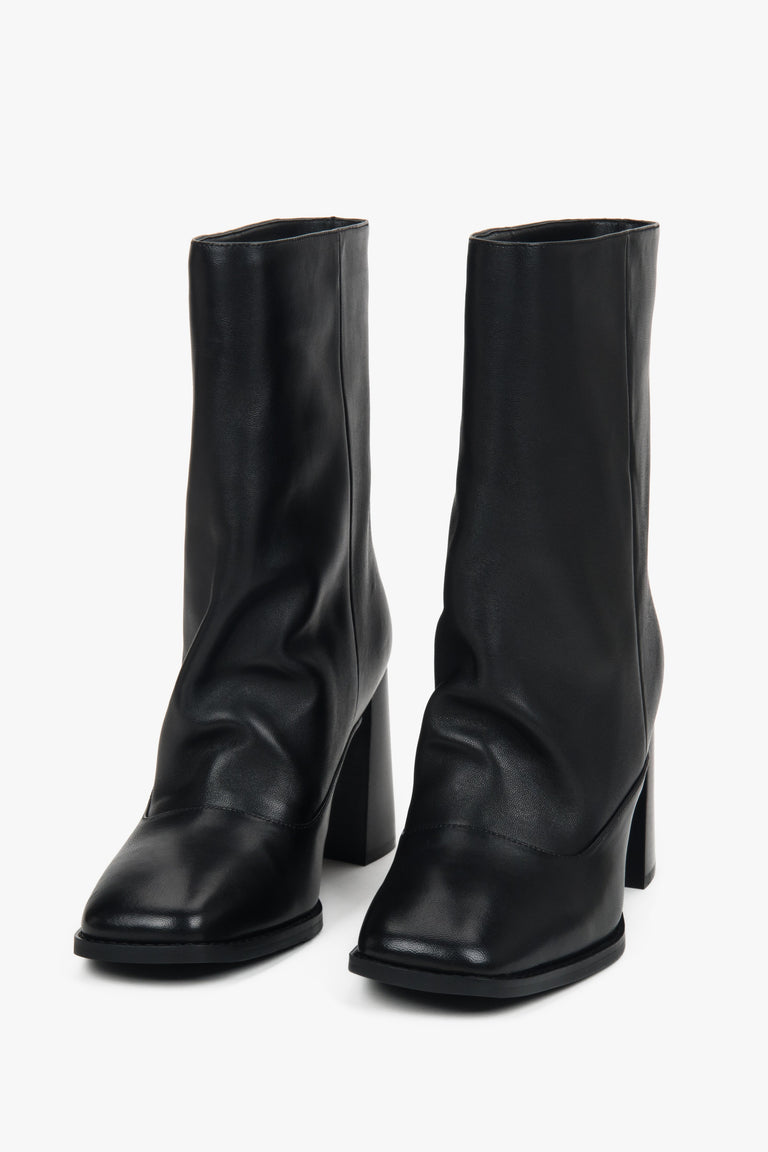 Black low women’s ankle boots Estro with a loose shaft made of natural leather.