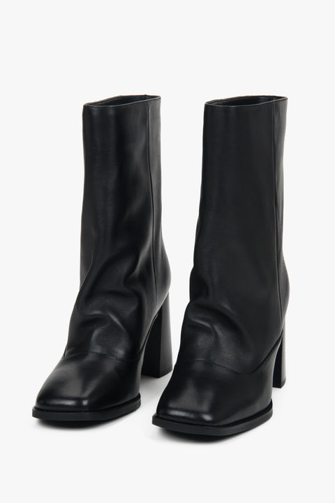 Black low women’s ankle boots Estro with a loose shaft made of natural leather.