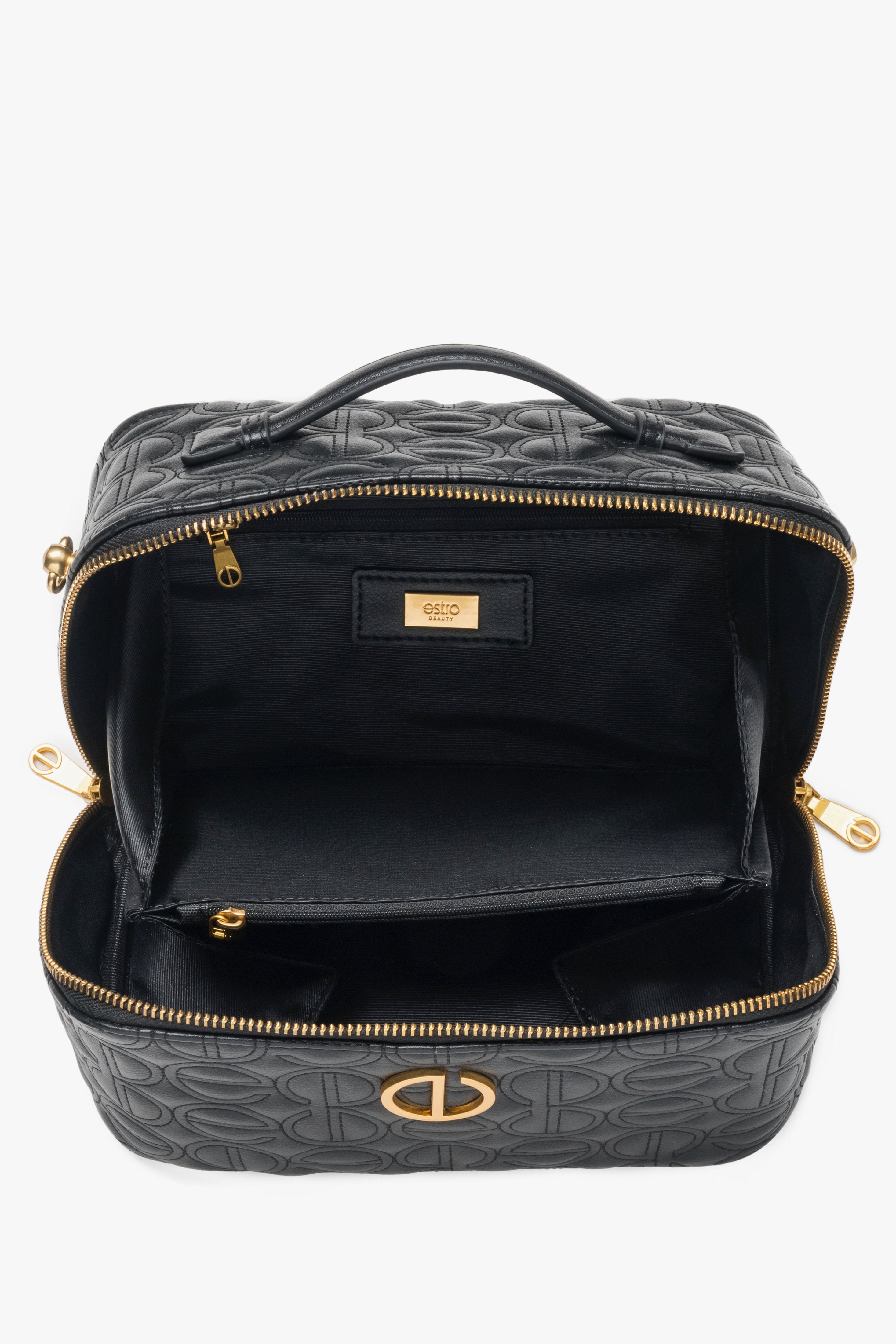 Women's stylish black leather makeup bag with gold accents and embossed brand logo by Estro.