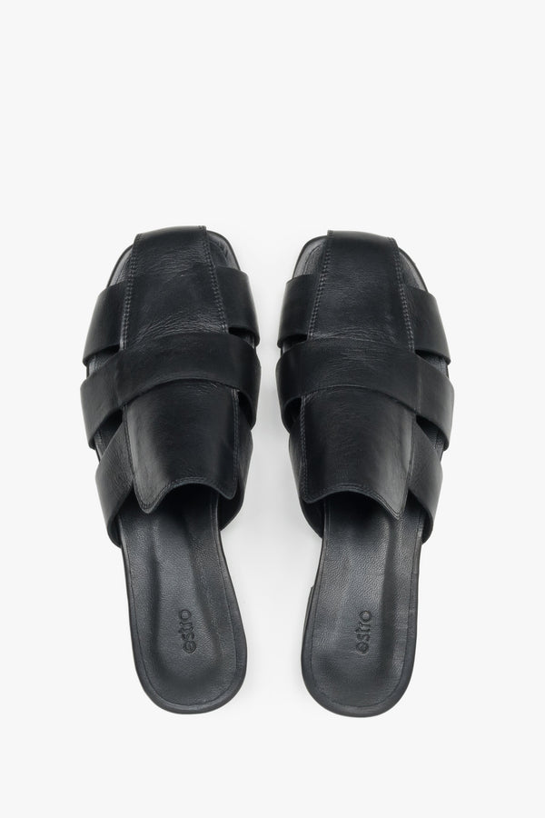 Backless pair of mules showcasing an interlaced front design, a fashionable square toe, and a smooth black insole featuring the brand logo.