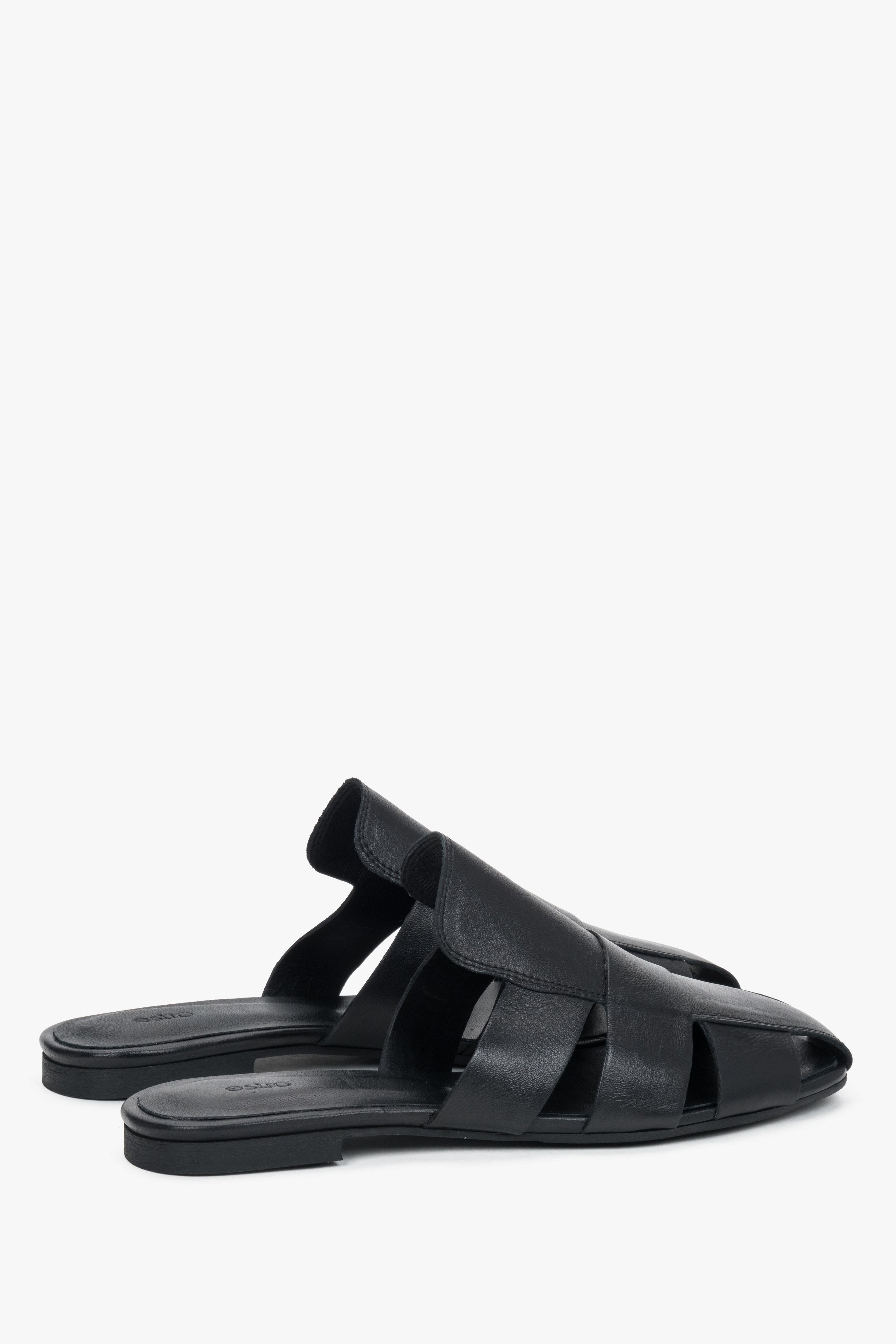 Rear view of the footwear, showcasing the open heel construction and the precise, luxurious finishing of the edges in black smooth leather.