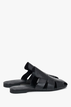 Rear view of the footwear, showcasing the open heel construction and the precise, luxurious finishing of the edges in black smooth leather.