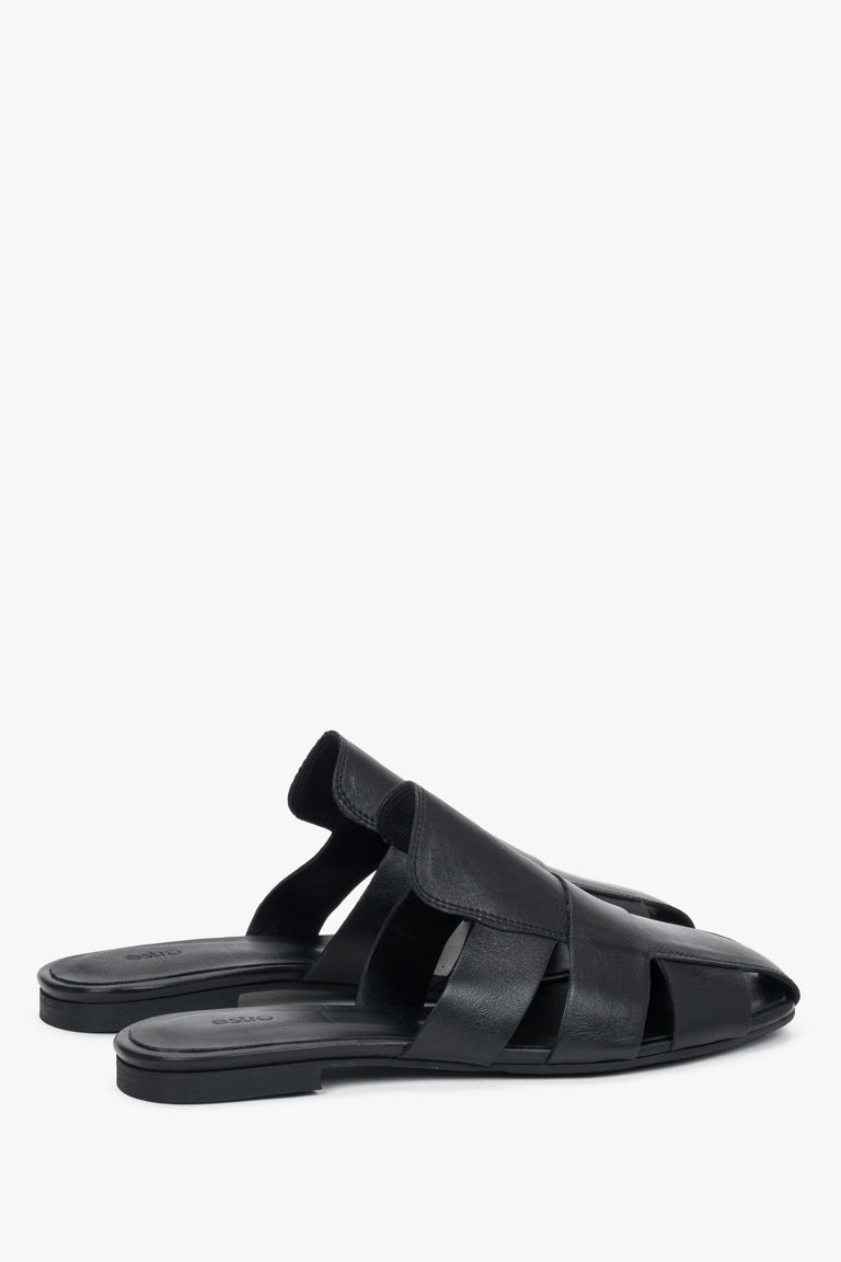 Rear view of the footwear, showcasing the open heel construction and the precise, luxurious finishing of the edges in black smooth leather.