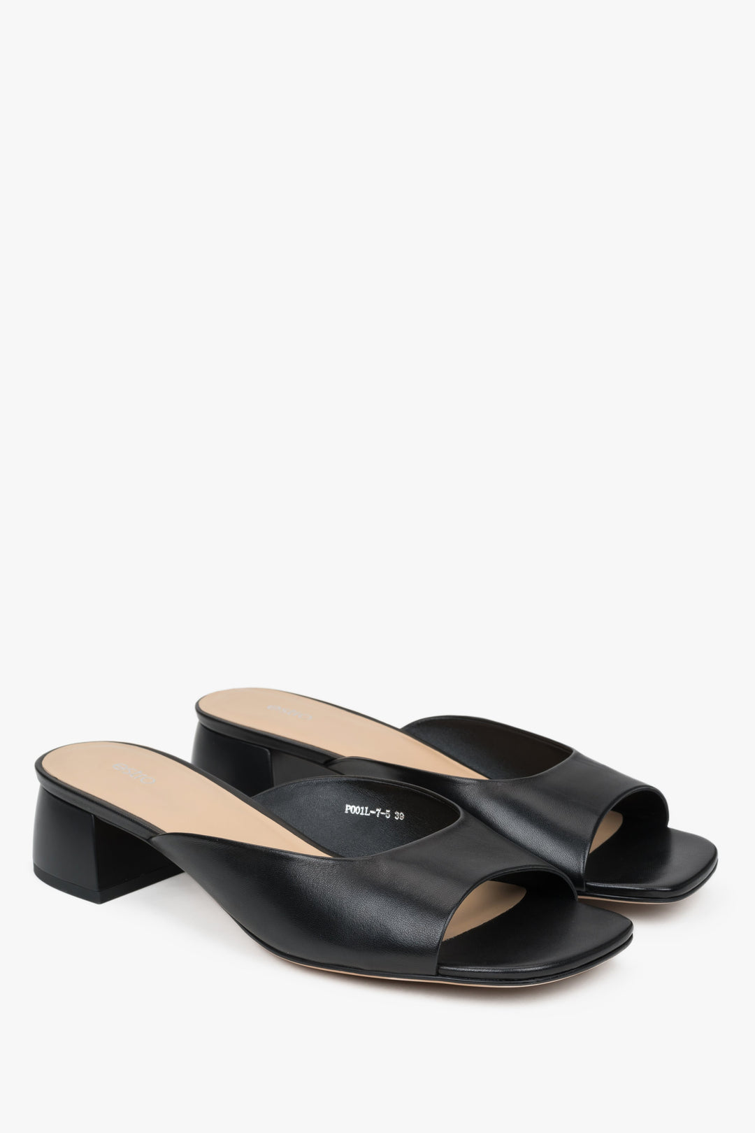 Black women’s leather mules with low heel.