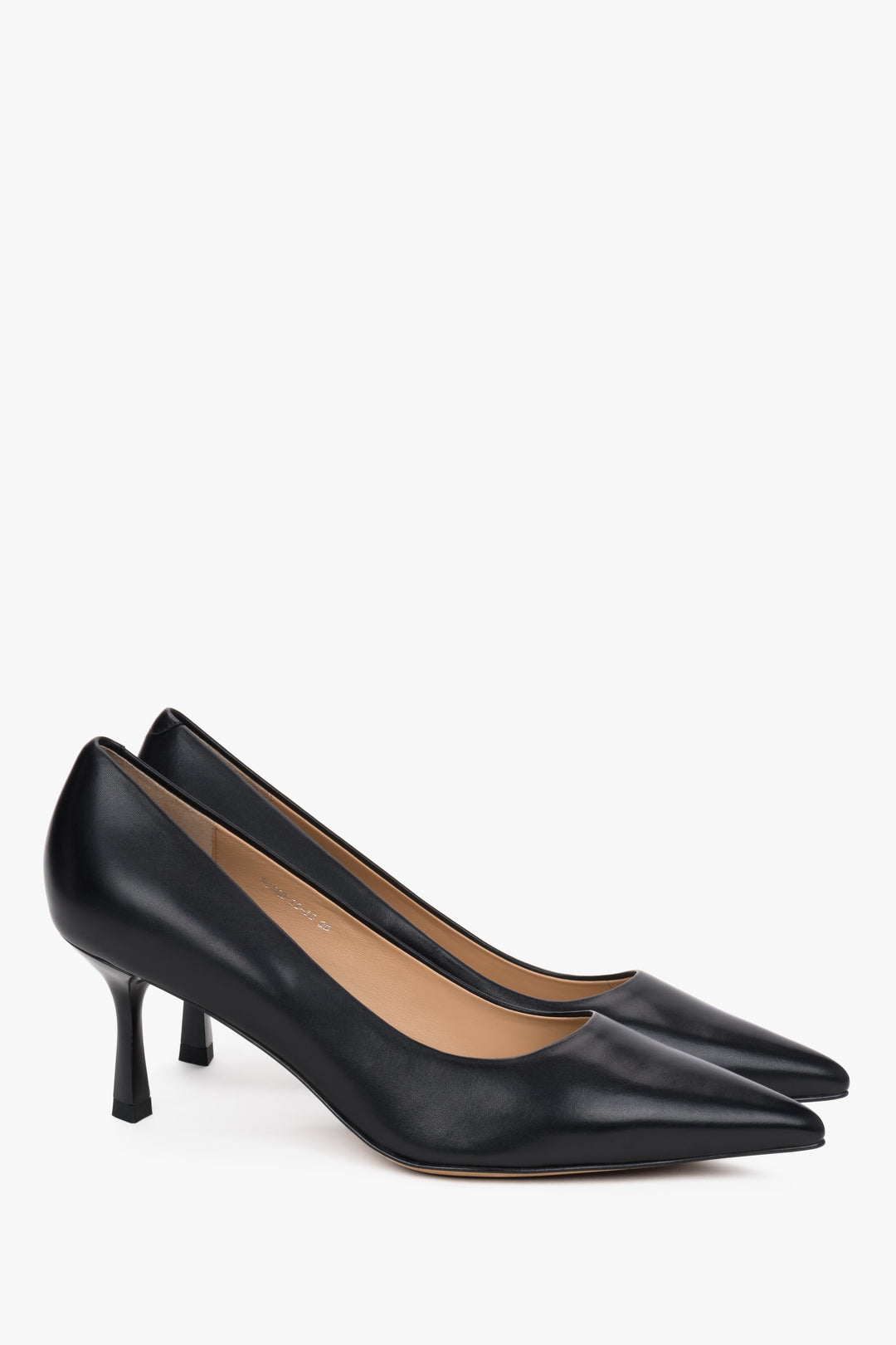 Close-up of black leather and pointed-toe design.
