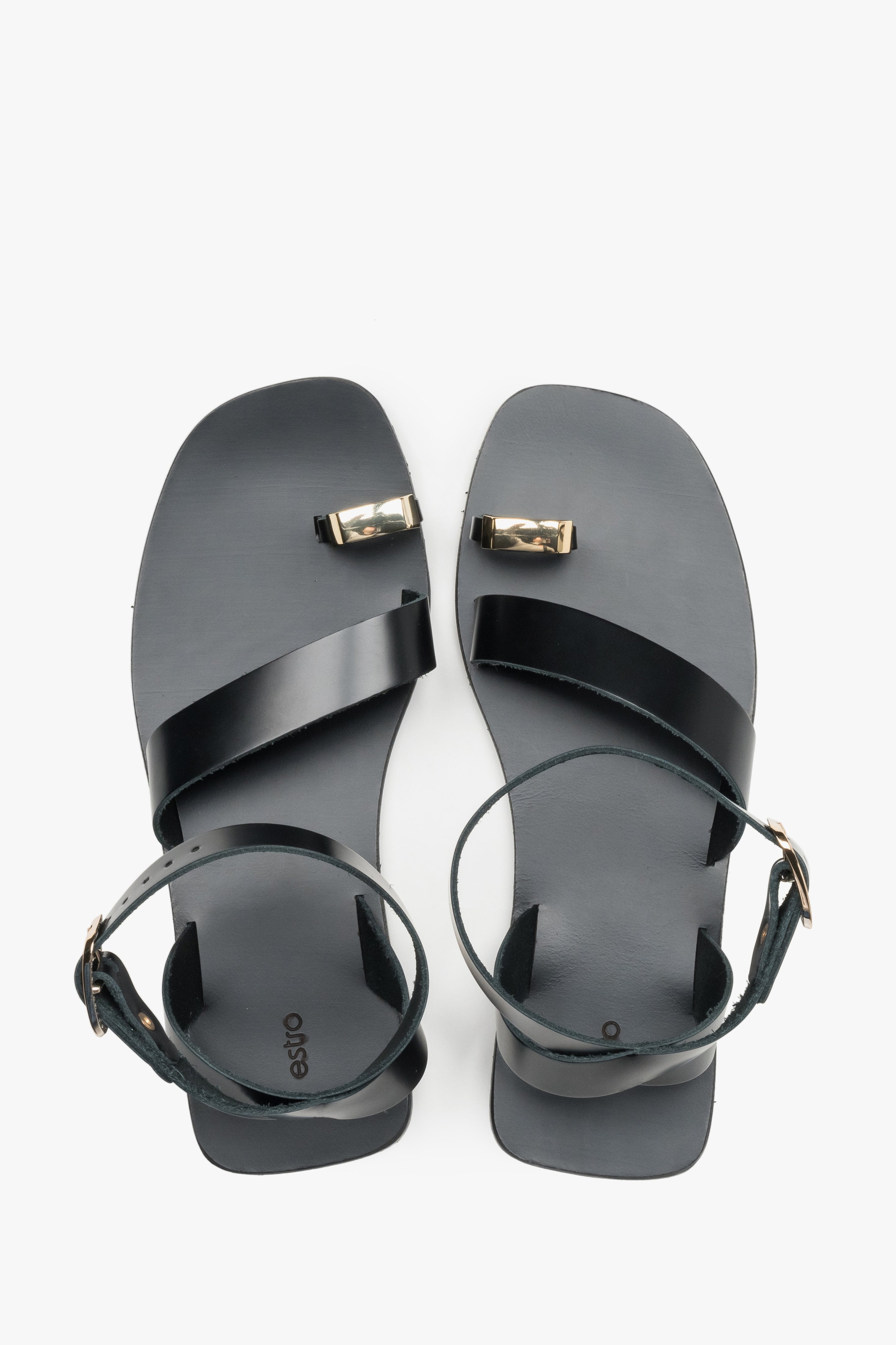 Women’s black leather sandals with a decorative toe ring by Estro - top view.