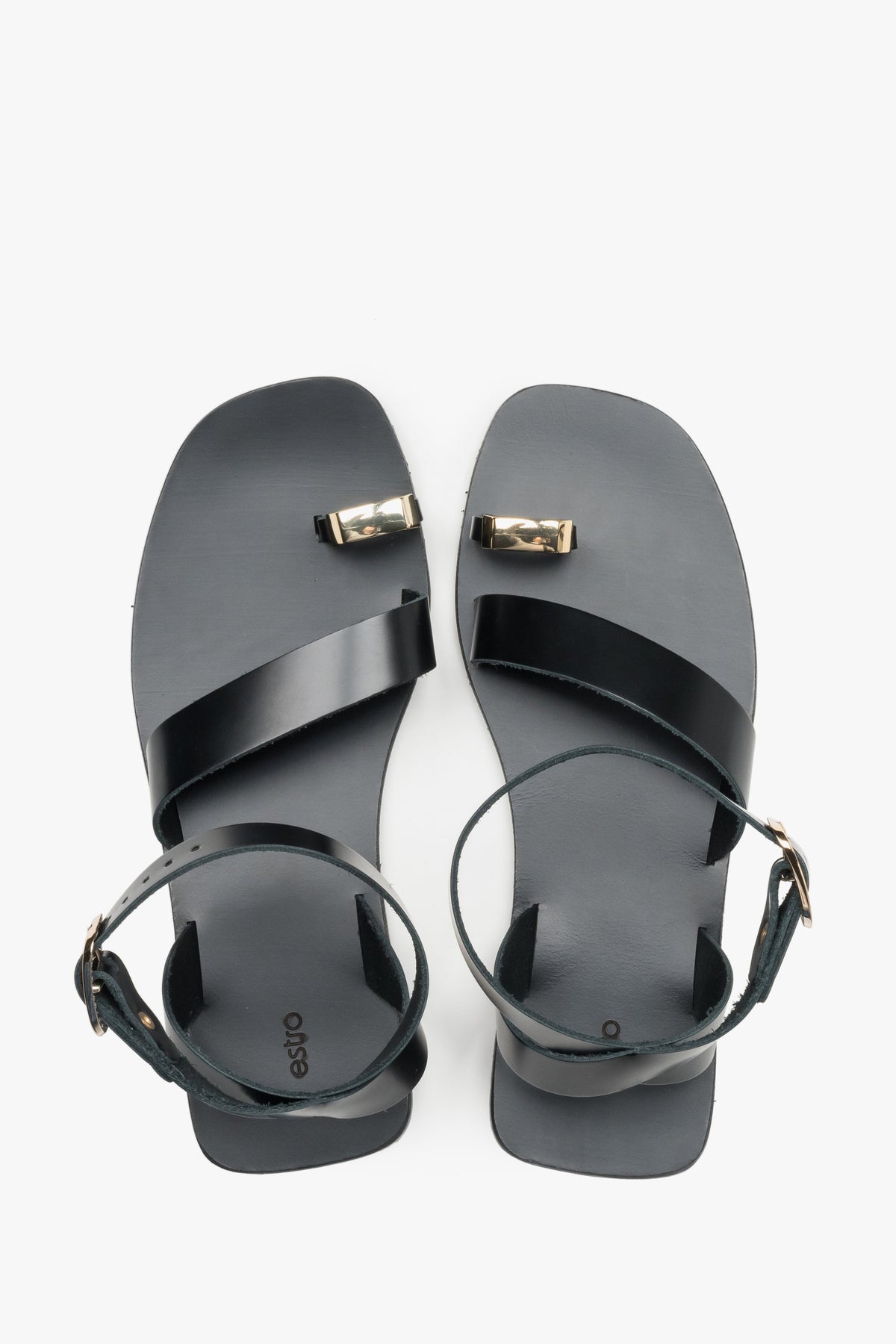 Women’s black leather sandals with a decorative toe ring by Estro - top view.