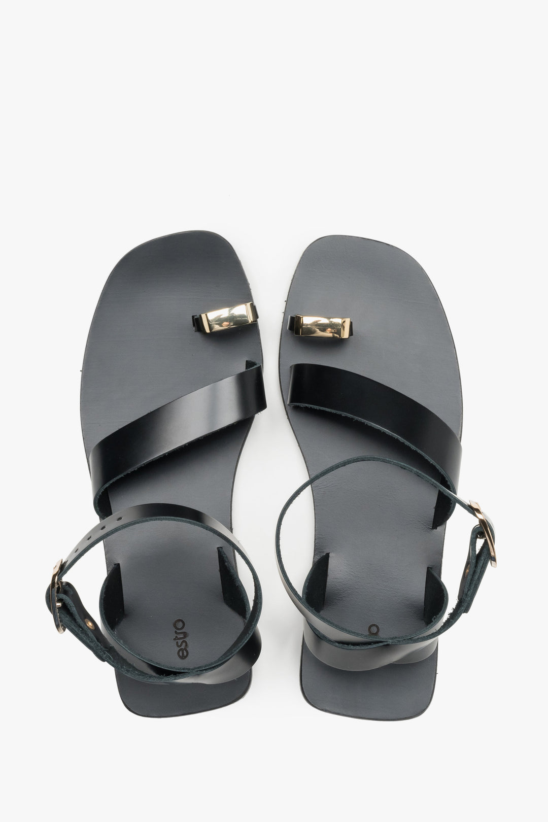 Women’s black leather sandals with a decorative toe ring by Estro - top view.