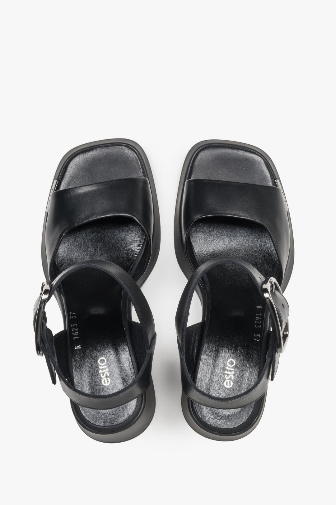 Women’s black leather sandals on a stable block heel with thick straps by Estro – top view.