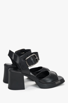 Women’s black genuine leather sandals on a stable block heel with thick straps by Estro – heel view.