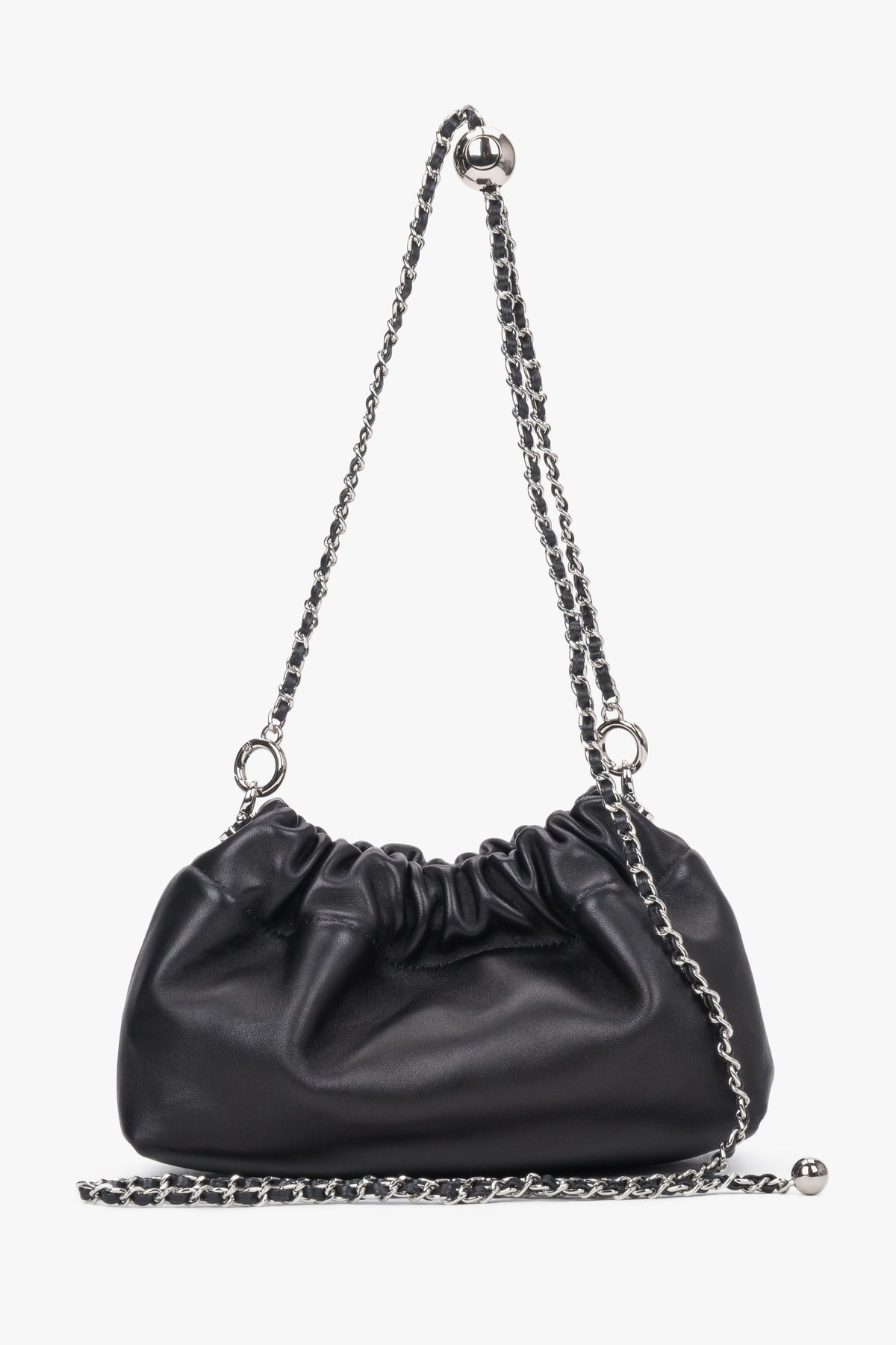 Side view of women's black leather shoulder bag with chain