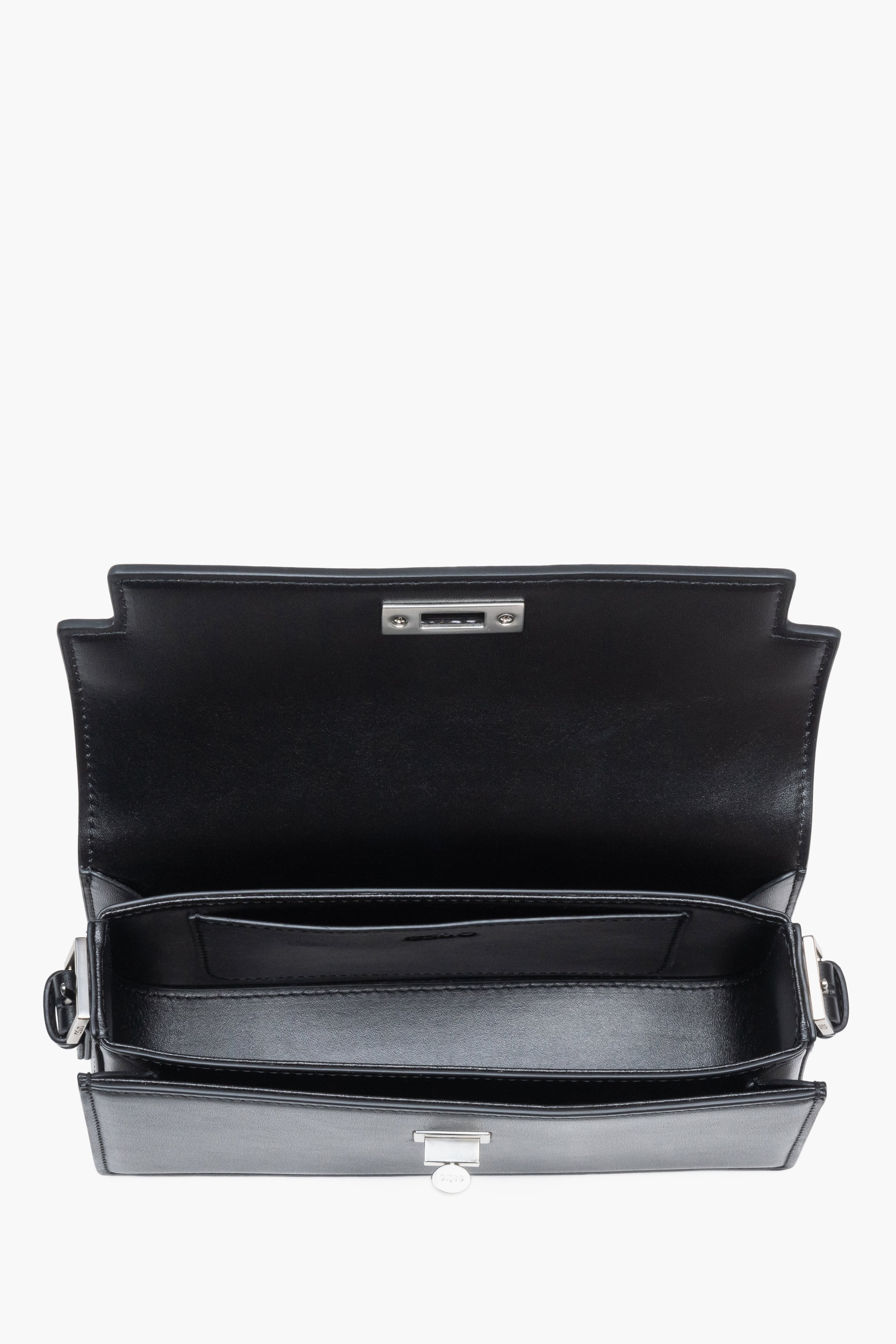 Interior view of women's black leather shoulder bag by Estro