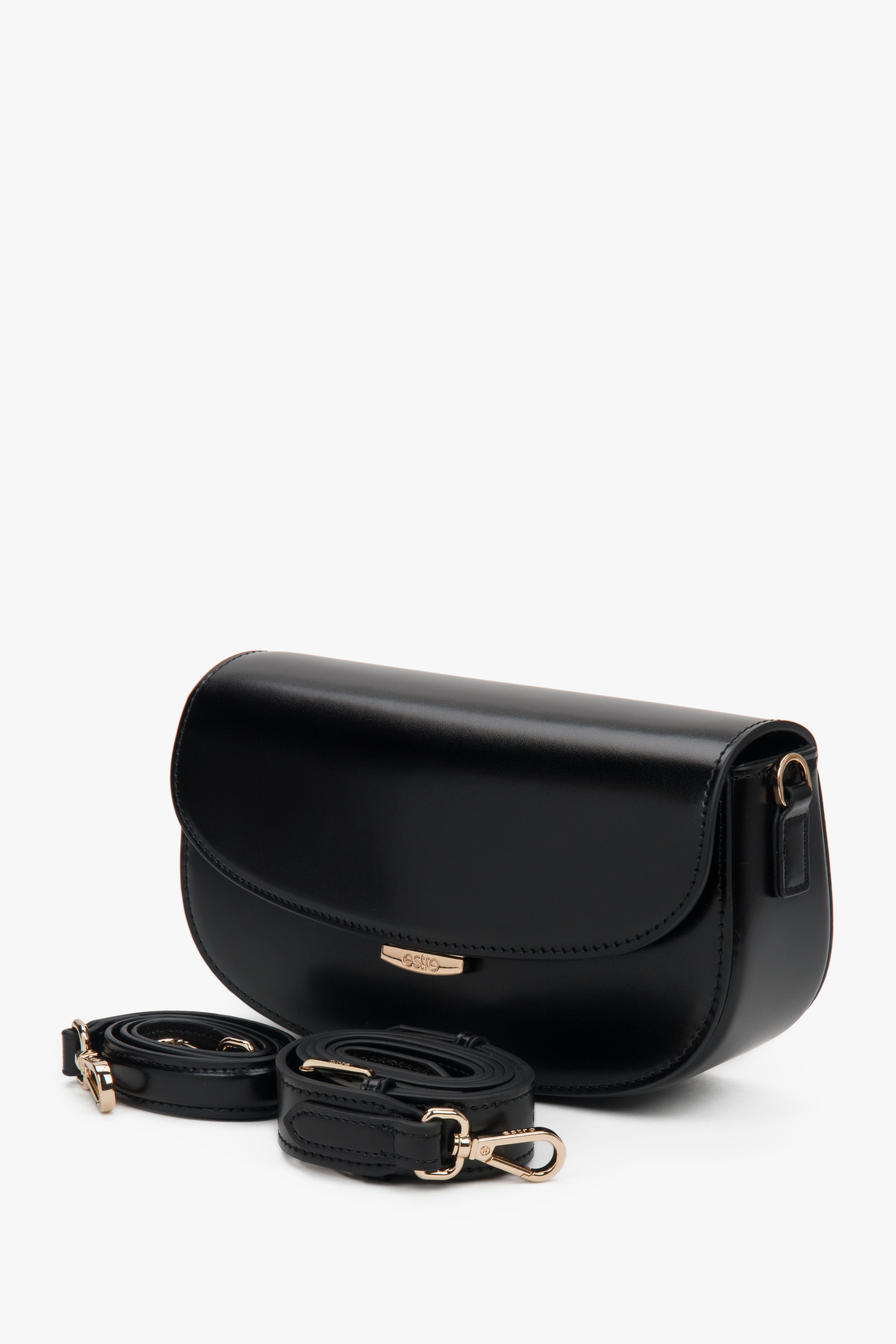 Compact black leather bag featuring one main compartment and two pockets.