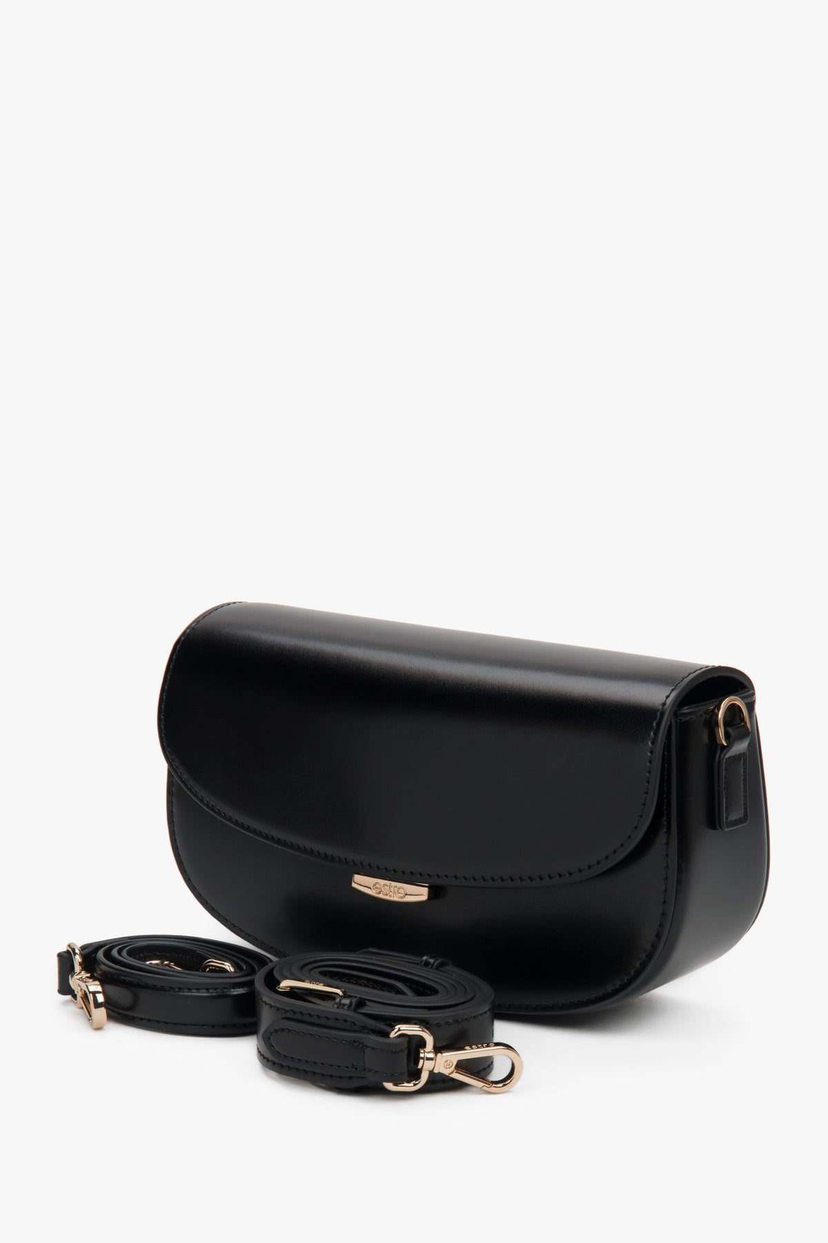 Compact black leather bag featuring one main compartment and two pockets.