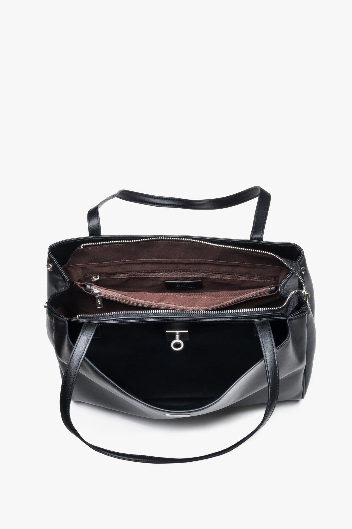 Interior view of women's black leather shoulder bag with compartments
