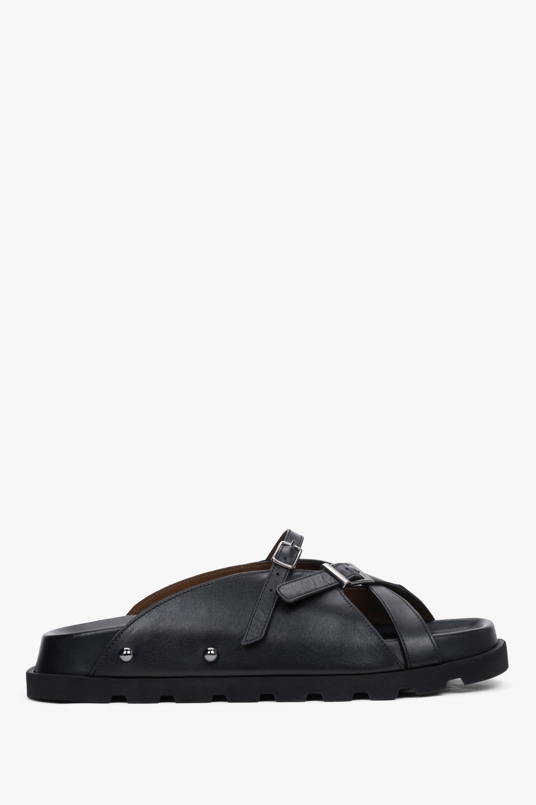 Side view of women's black leather slide sandals by Estro