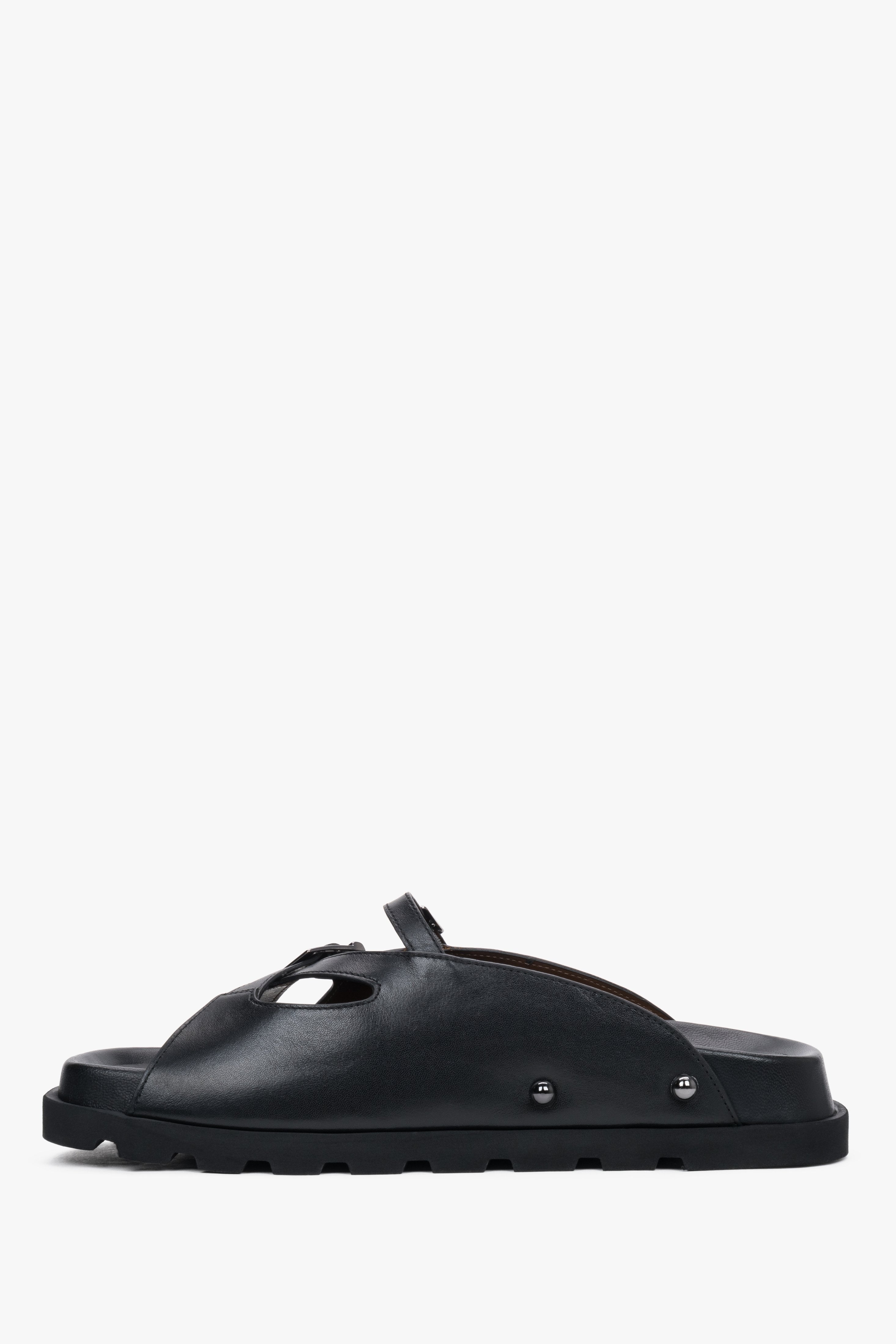 Low side view of women's black leather slide sandals by Estro
