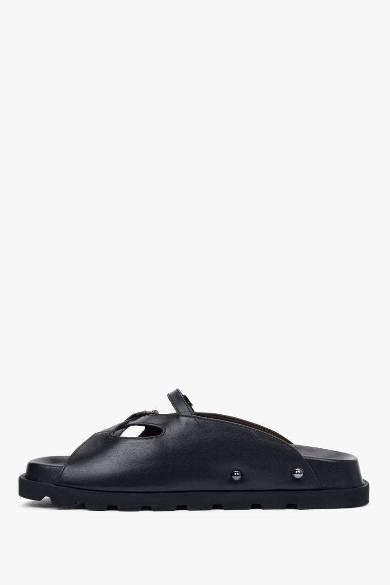 Low side view of women's black leather slide sandals by Estro