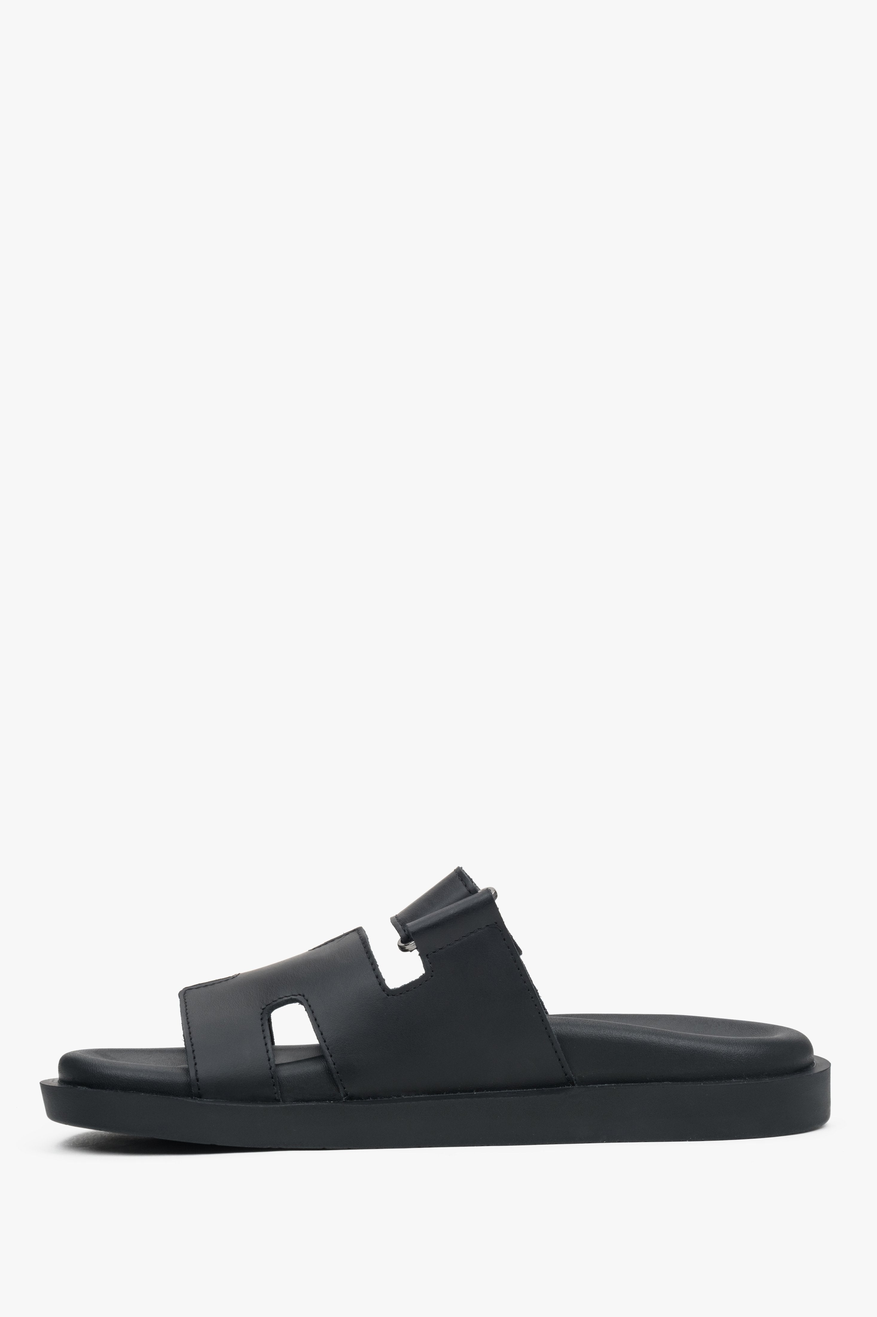 Women’s black leather sandals with a lightweight PU sole.