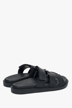 Minimalist black flat sandals Estro for everyday summer wear.