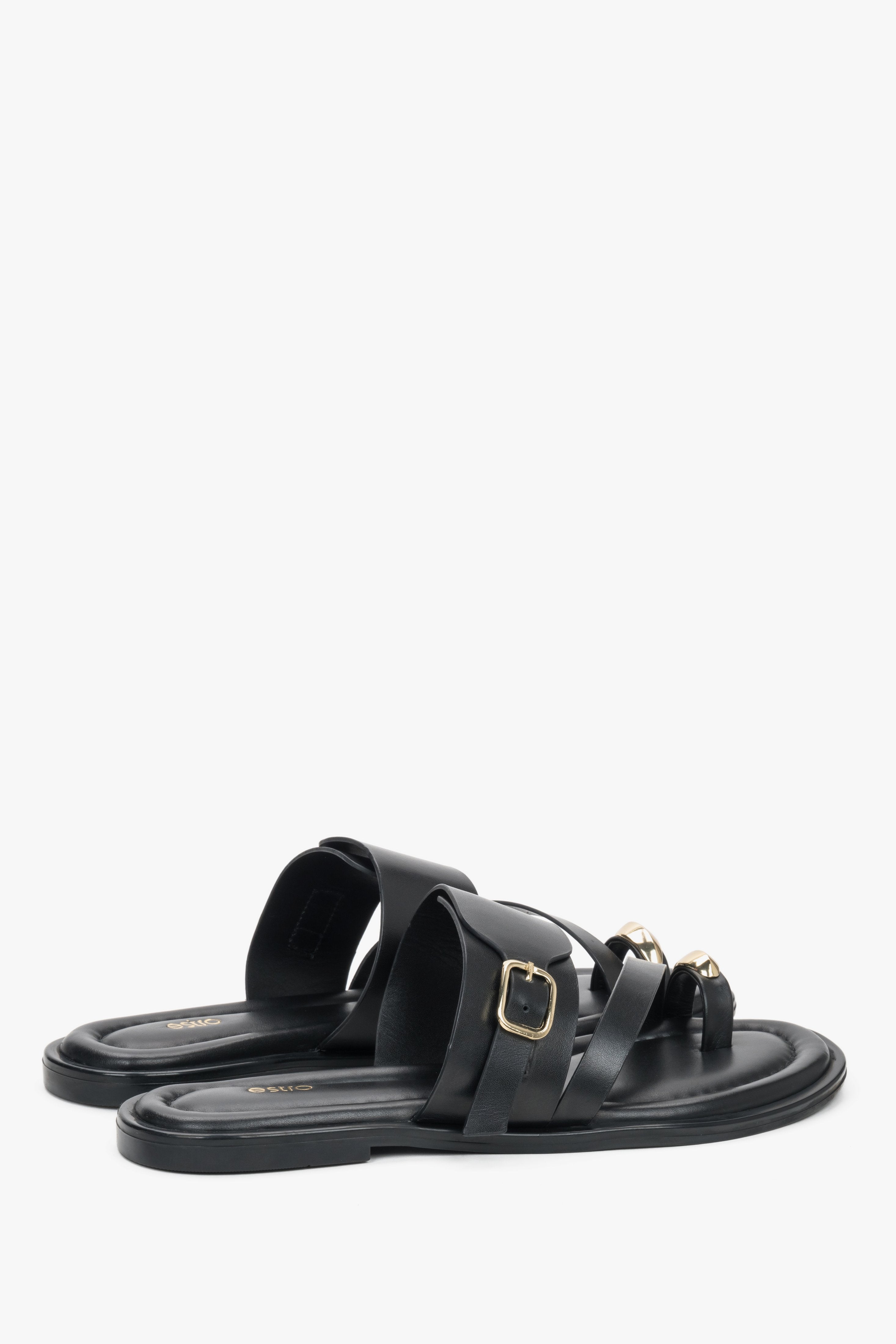 The underside of the shoe, showcasing a smooth black sole made of flexible thermoplastic polyurethane (TPU), ensuring durability and stability with every step.