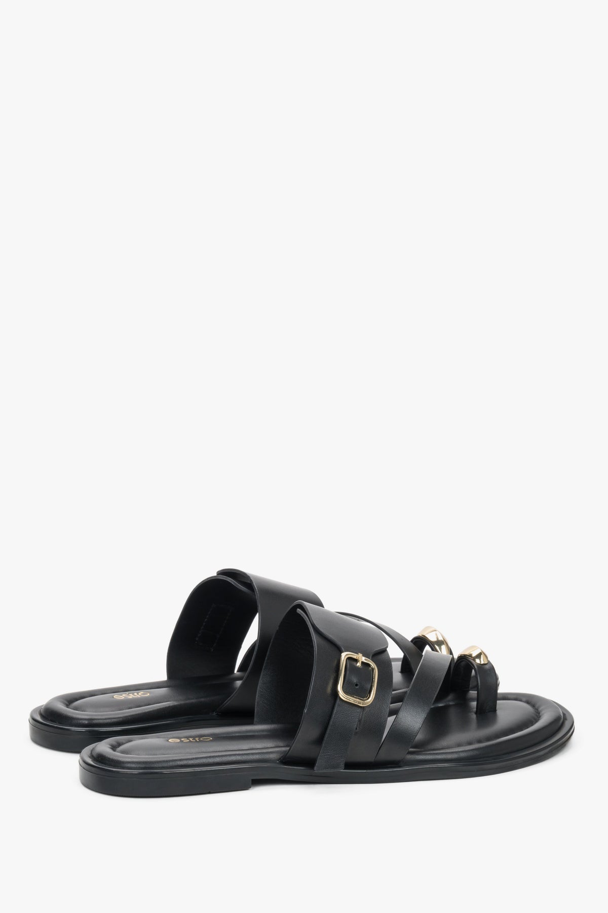 The underside of the shoe, showcasing a smooth black sole made of flexible thermoplastic polyurethane (TPU), ensuring durability and stability with every step.