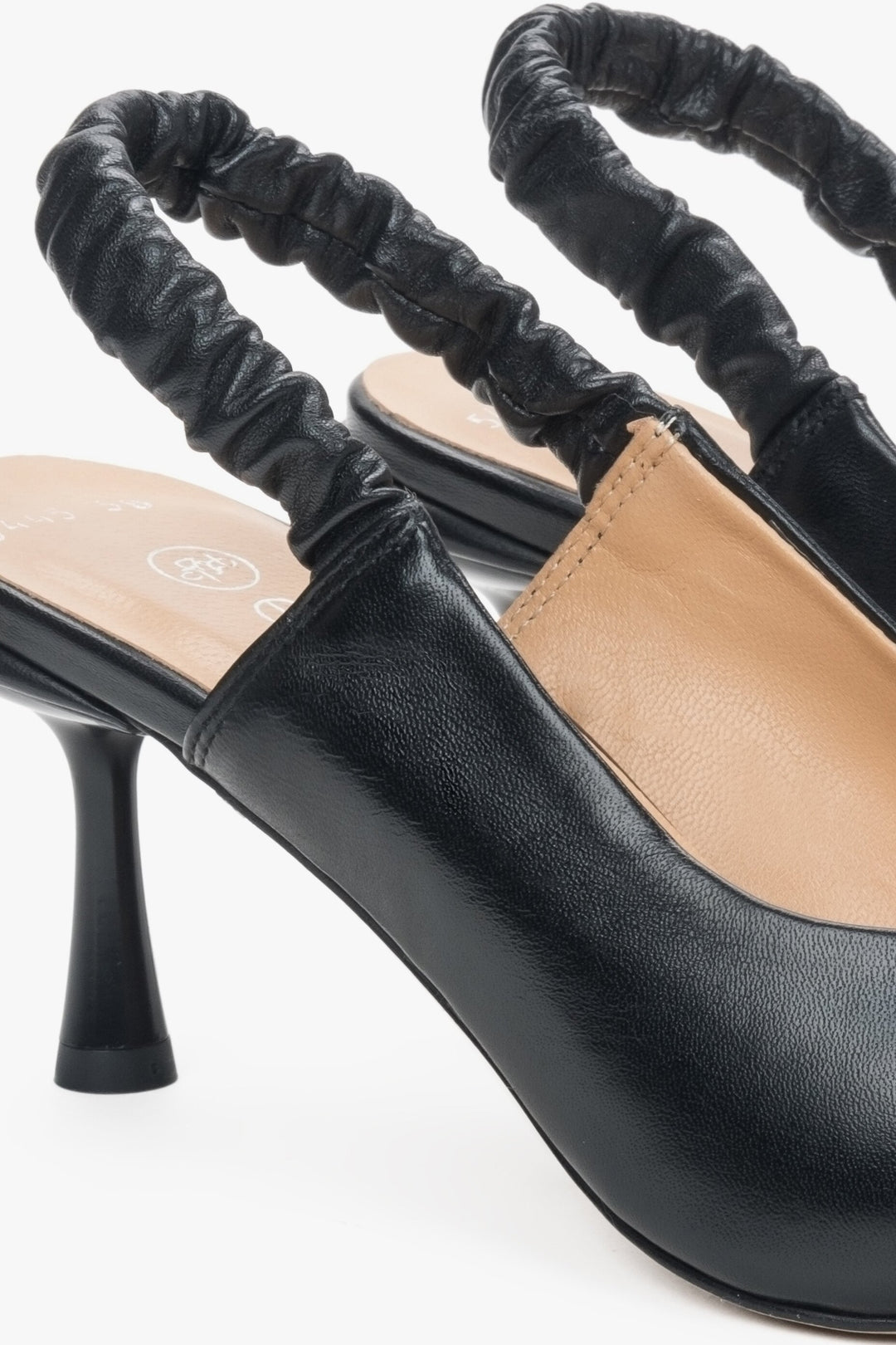 Women's black leather slingback shoes by Estro - close-up on the detail.
