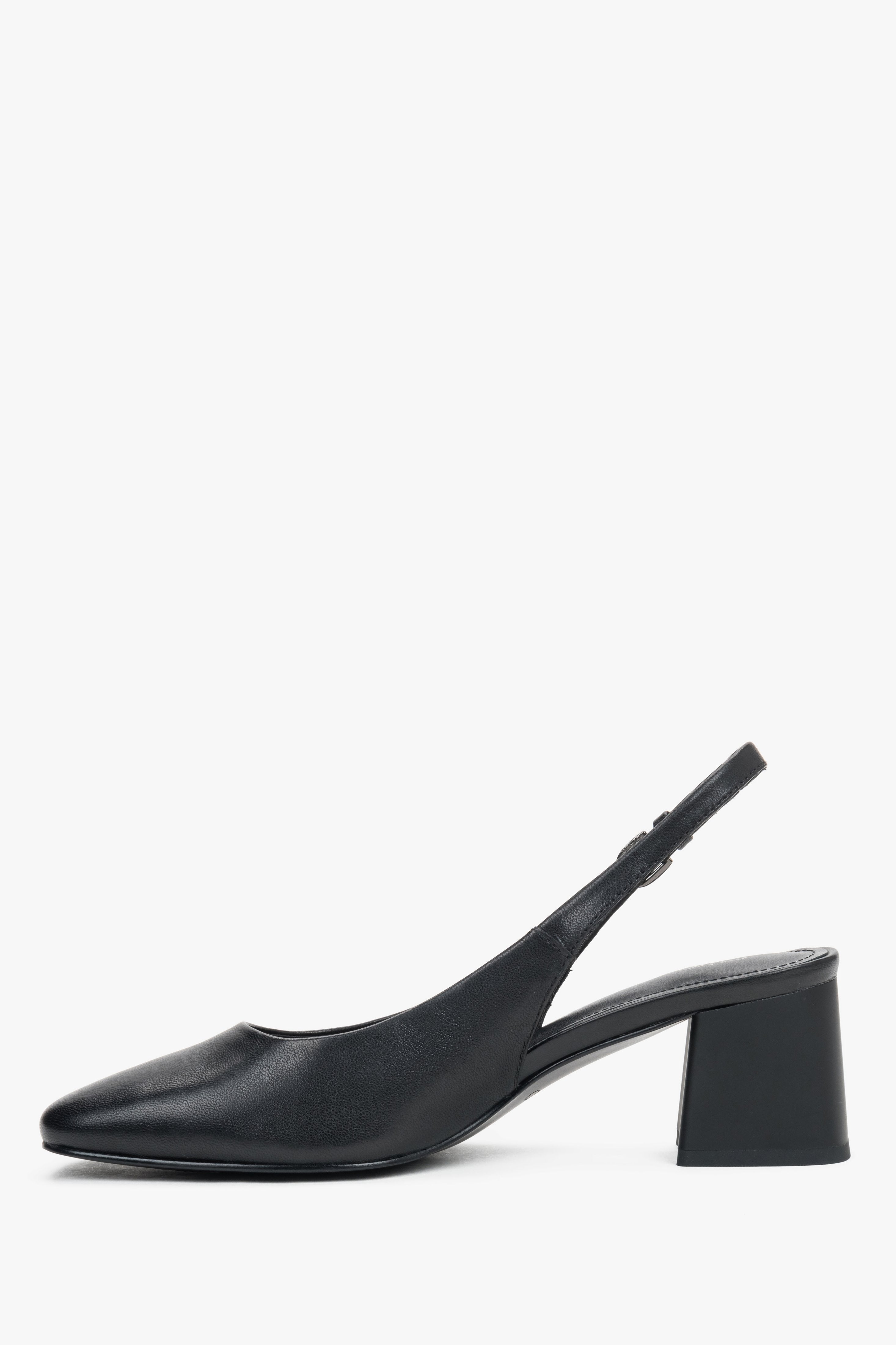Elegant black leather heels with an adjustable strap and square block heel.