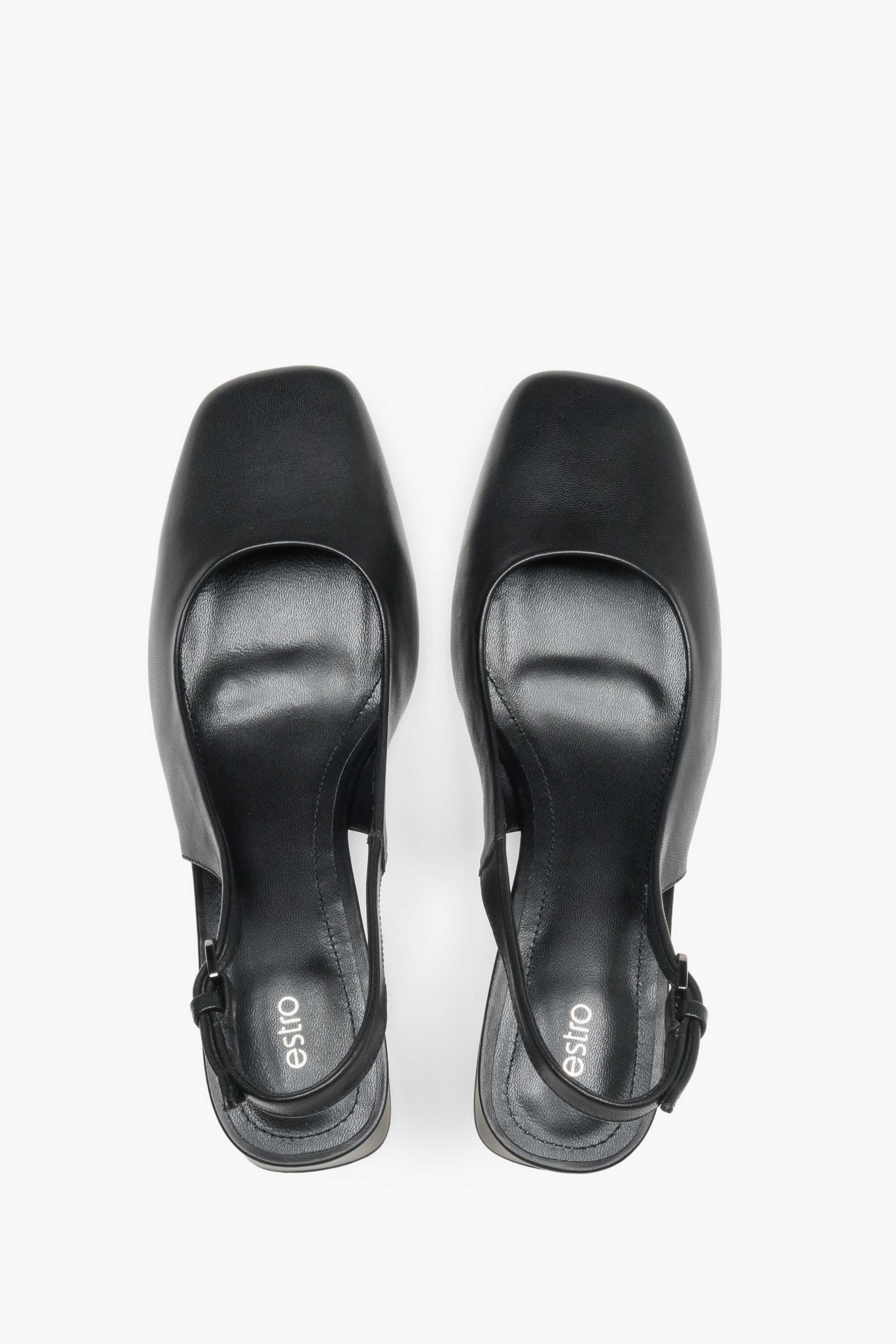 Estro black slingback pumps featuring a luxury natural kidskin leather lining.