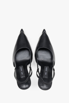 Top view of women's black leather slingback stilettos with pointed toe