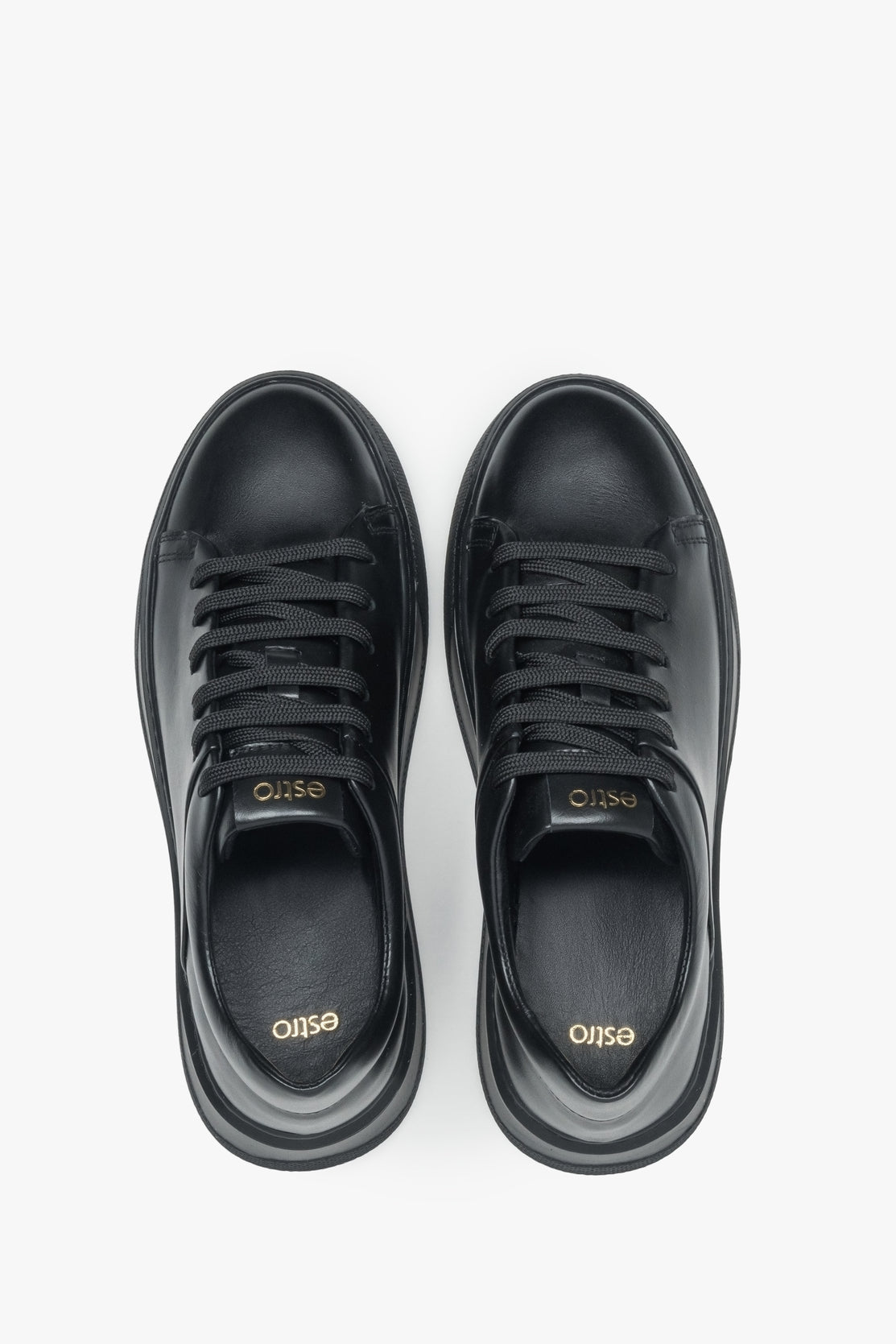 Black leather women's sneakers - top view presentation.