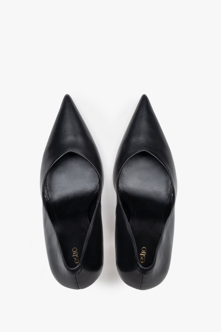 Black leather women's stiletto pumps by Estro, featuring a slim high heel and a pointed toe.