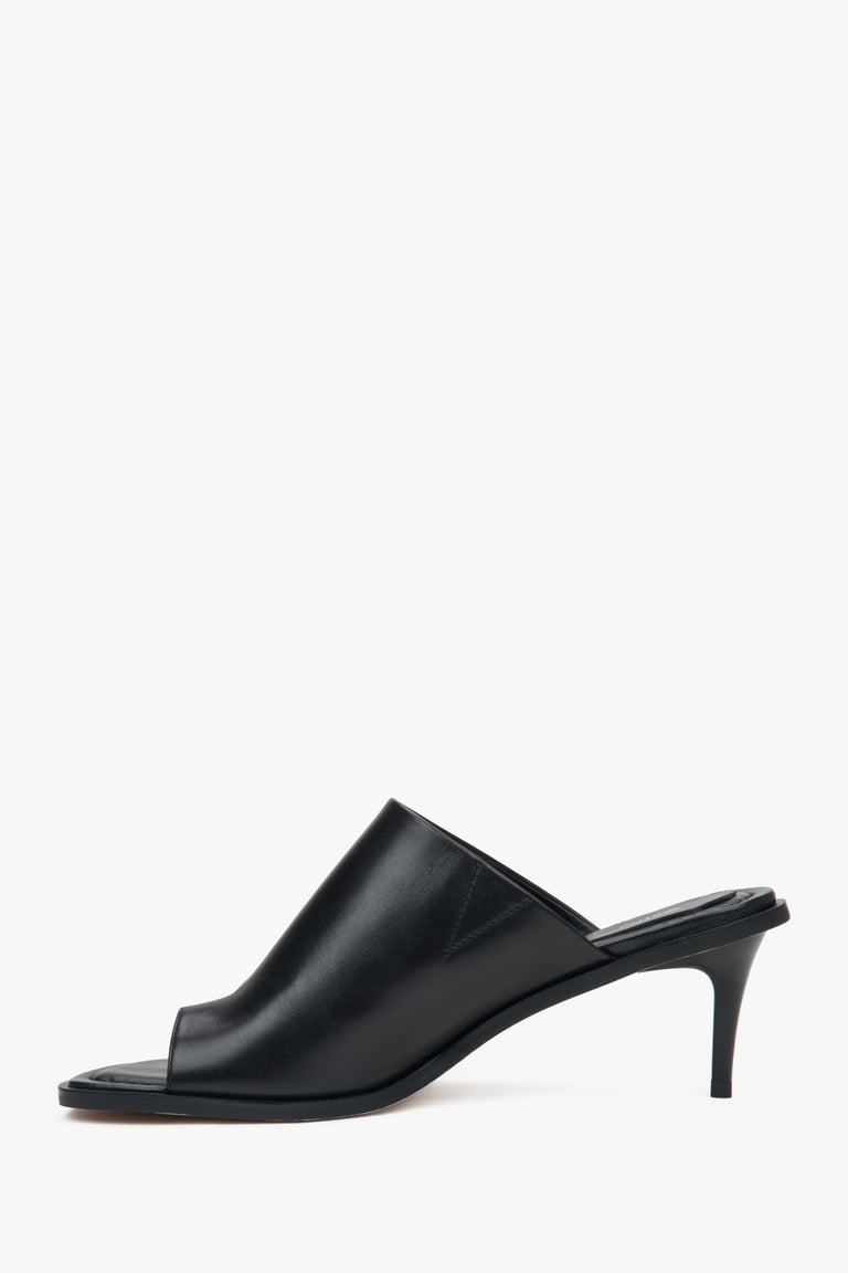 Estro black women’s leather stiletto mules with a toe ring.